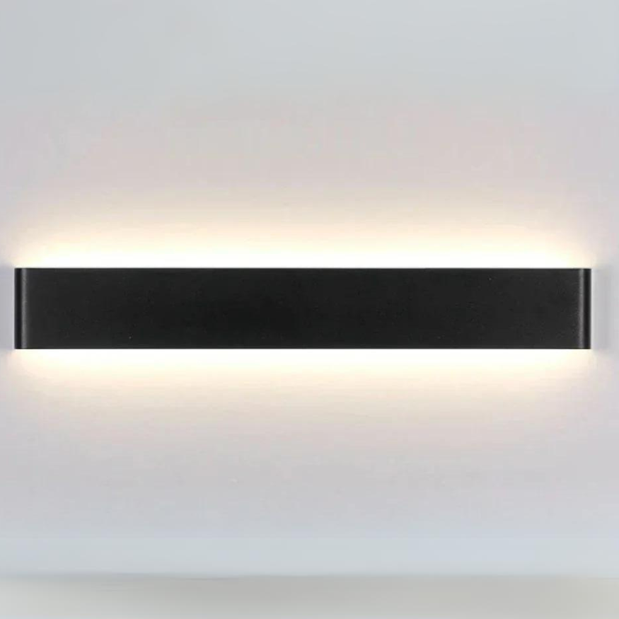 Modern Nordic LED wall sconce with brushed aluminum finish in living room setting.