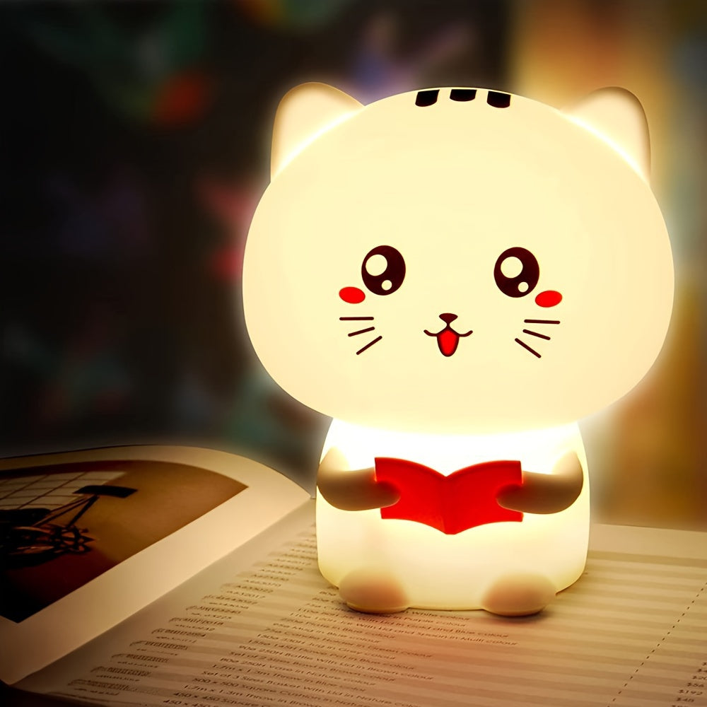 Cute reading kitty night light with 7 color-changing modes, soft silicone design, USB rechargeable, perfect for anime lovers and kids' room decor.