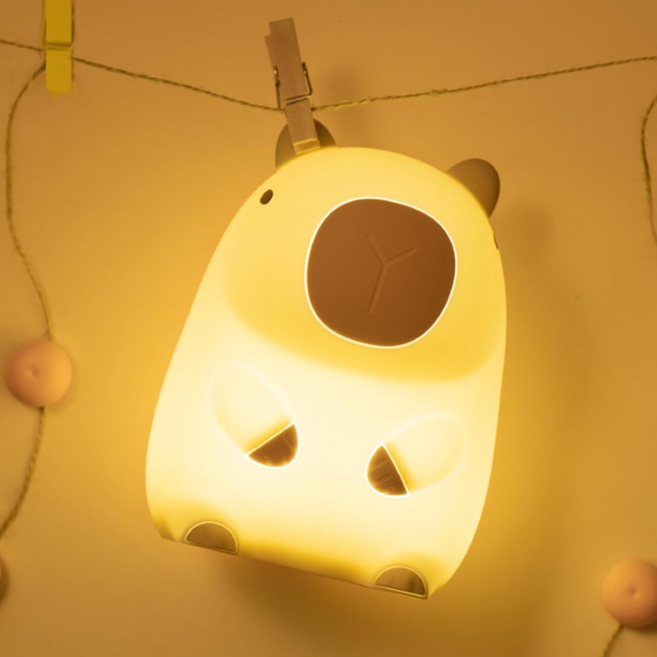 Squishy capybara-shaped night light, dimmable and rechargeable with touch control, perfect for kids' bedrooms and kawaii decor.