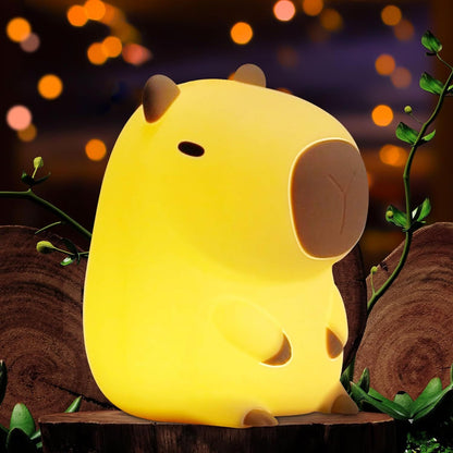 Squishy capybara-shaped night light, dimmable and rechargeable with touch control, perfect for kids' bedrooms and kawaii decor.