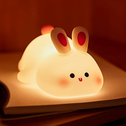 Adorable rabbit silicone night light, USB rechargeable and dimmable, perfect for kids' bedrooms or as a cute desk lamp for cozy spaces.