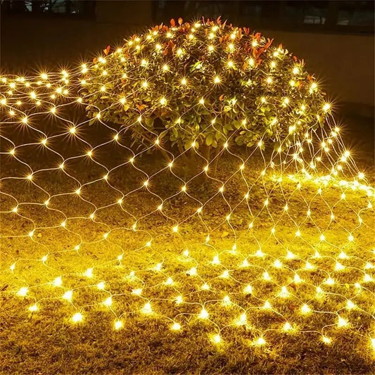 Solar LED net lights, warm white festive outdoor lights, Lumora energy-saving net lights for gardens, Christmas net lights for bushes and fences.