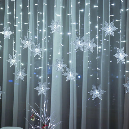 Christmas snowflakes LED string lights, 3.2M waterproof curtain fairy lights for festive home, holiday, and party decorations.