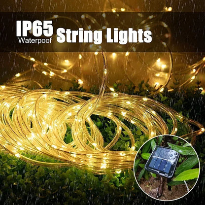 Solar-powered 300 LED rope lights perfect for outdoor Christmas decorations, lighting up gardens, pathways, and trees.