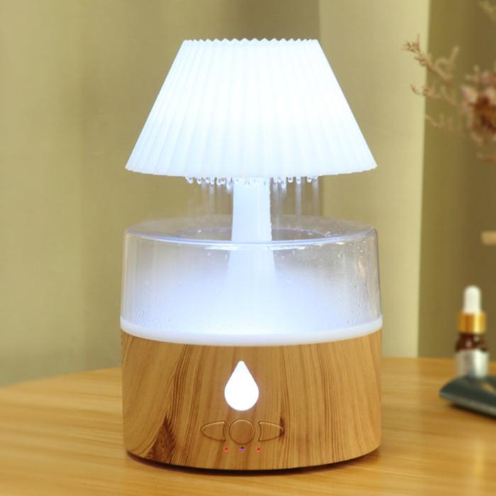 Rain Cloud Humidifier with cool mist, aromatherapy diffuser, and colorful night light, USB-powered for bedroom relaxation.