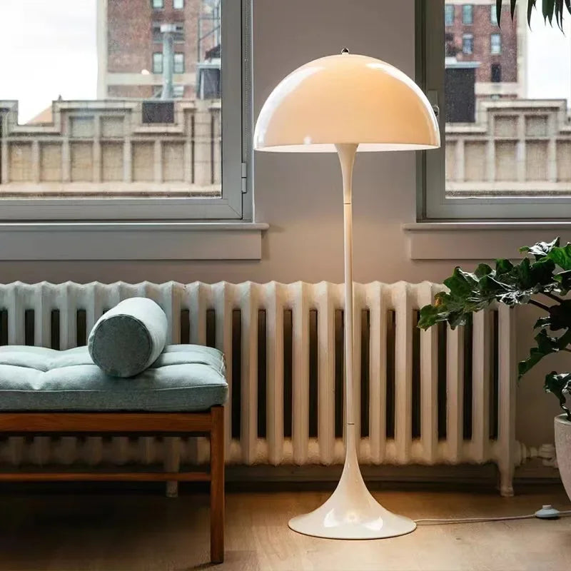 Mid-century modern Danish table lamp illuminating a stylish living room.