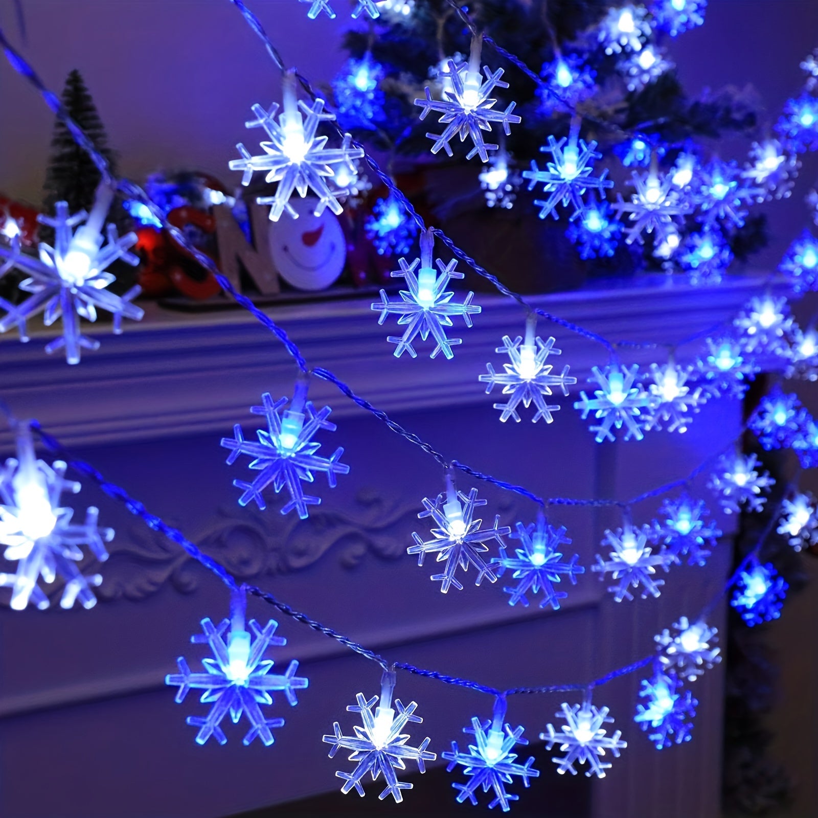 Battery-operated snowflake string lights with a cozy warm glow, ideal for holiday decor in living rooms, corridors, and Christmas trees.