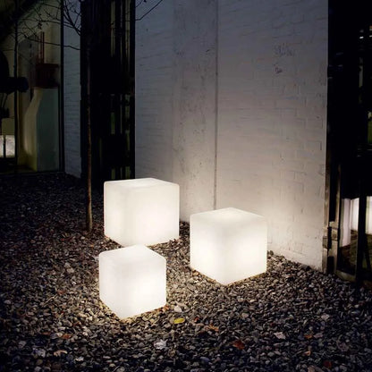 Solar-powered cubic garden light with LED illumination, ideal for outdoor garden and patio decor