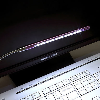 USB-powered LED Keyboard Light with flexible metal cable, providing warm or cool white light, available in sleek metallic colors.