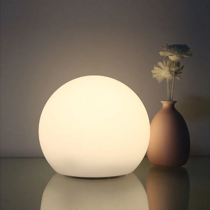 Modern Table Globe Lamp with 16 color settings, rechargeable and remote-controlled, ideal for creating cozy ambiance in any room.