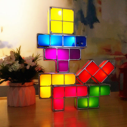 Colorful Tetra Blocks LED Light, customizable stacking lamp with seven pieces, creating vibrant designs and lighting displays for playful decor.