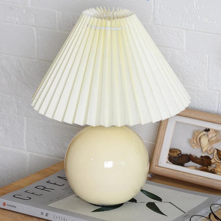 Vintage pleated table lamp with ceramic base and tricolored LED bulb, ideal for bedroom night light decor