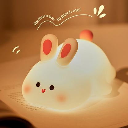 Squishy LED night light shaped like a cute animal, perfect for kids' bedrooms with 3 dimmable brightness levels and touch control.