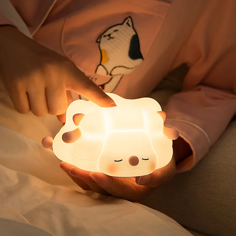 Squishy LED night light shaped like a cute animal, perfect for kids' bedrooms with 3 dimmable brightness levels and touch control.