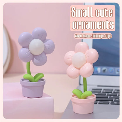 Mini LED flower-shaped night lights in pastel colors, placed on a shelf for kids’ bedroom decor and ambient lighting.