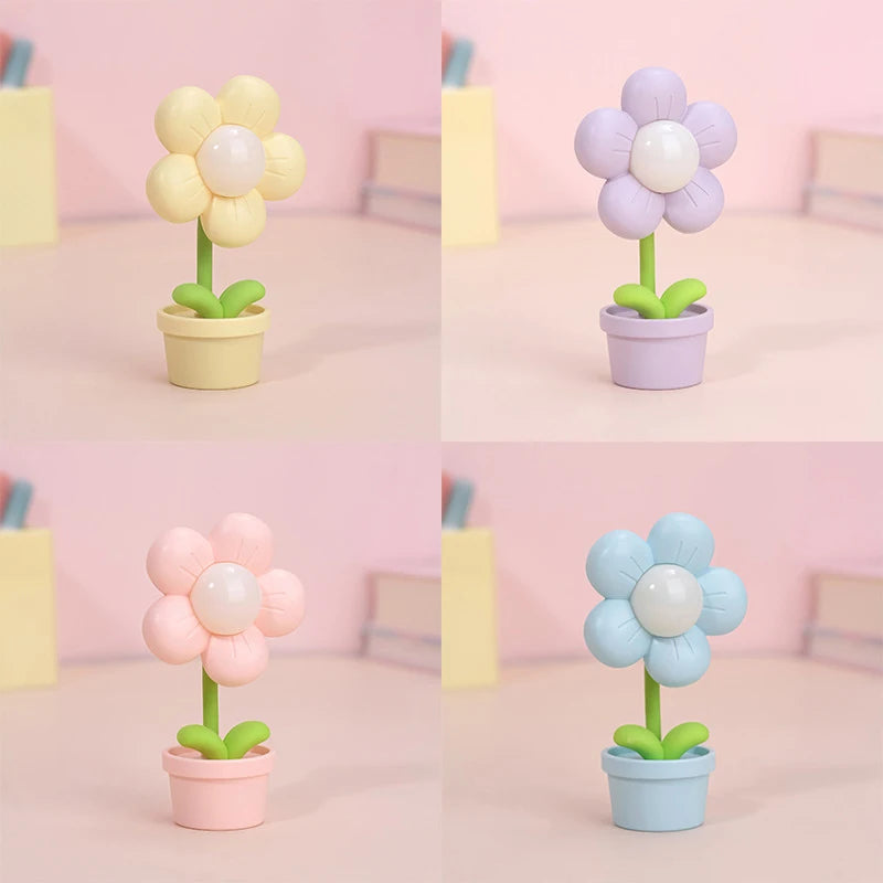 Mini LED flower-shaped night lights in pastel colors, placed on a shelf for kids’ bedroom decor and ambient lighting.