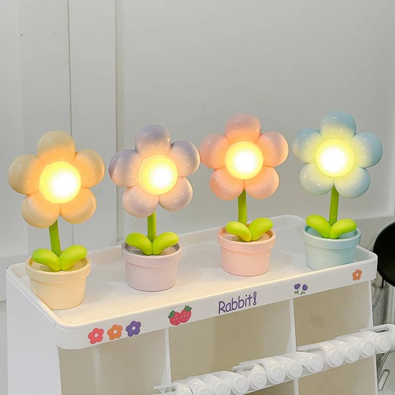 Mini LED flower-shaped night lights in pastel colors, placed on a shelf for kids’ bedroom decor and ambient lighting.