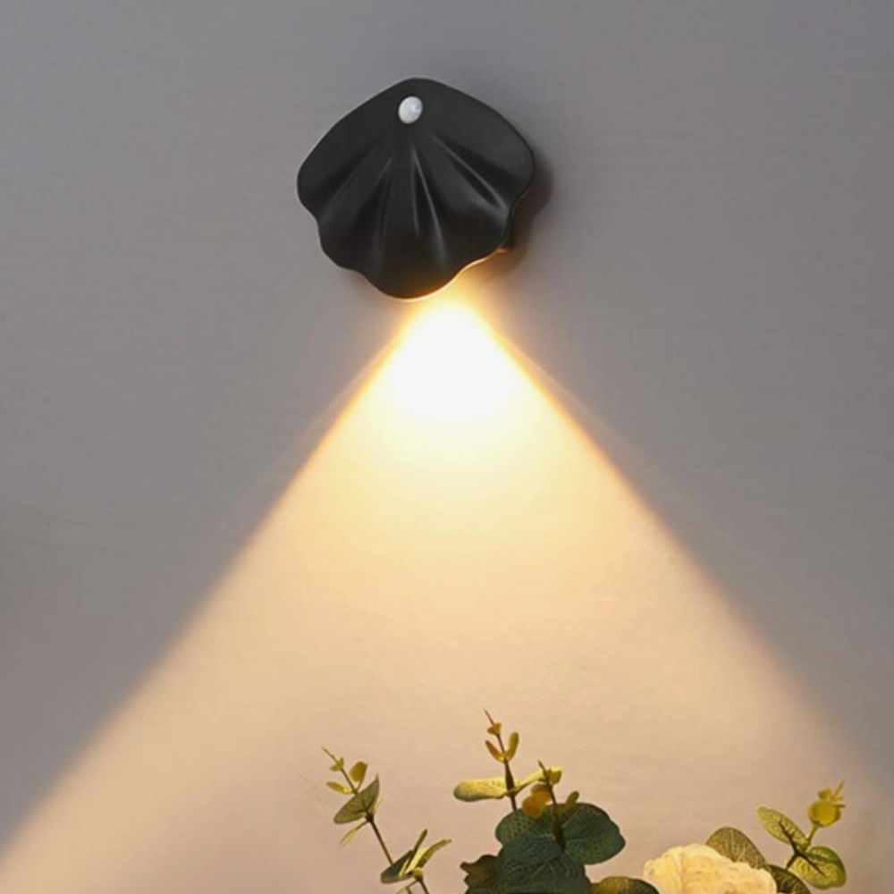 Smart motion-activated LED night light with a sleek design for home safety and convenience