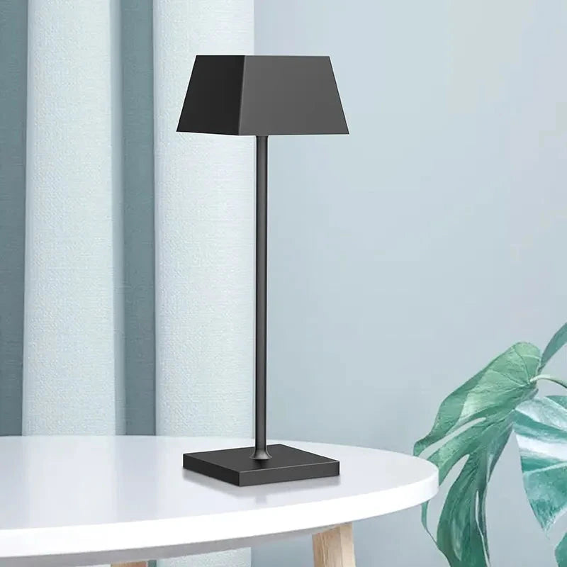 Rechargeable portable table lamp for indoor and outdoor use