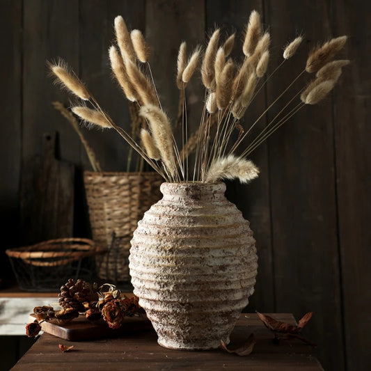 Handmade retro clay pottery vase with rustic textured finish, perfect for vintage and farmhouse decor.