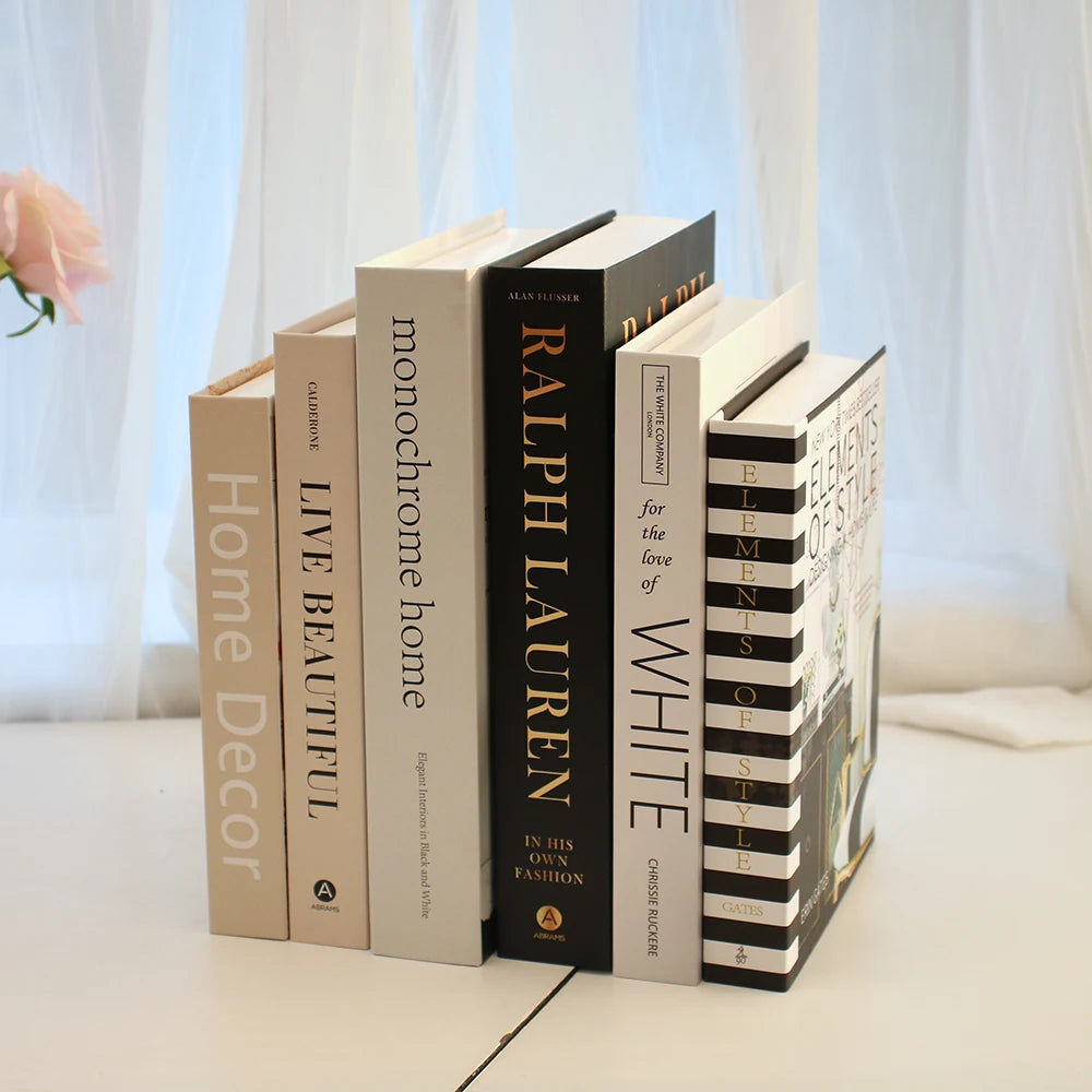 Elegant decorative books set on a modern coffee table, enhancing a chic living room atmosphere.