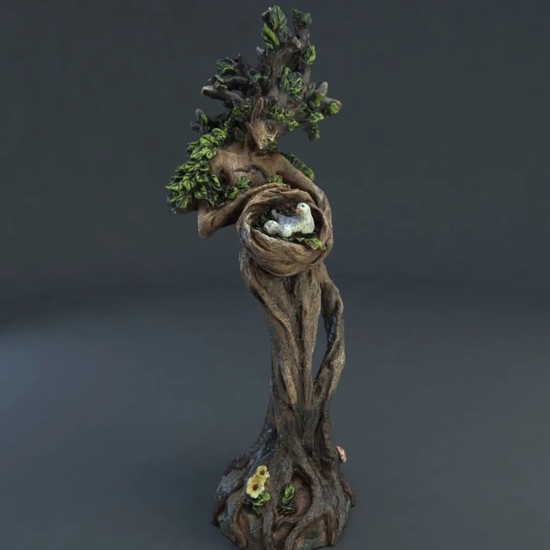 Forest Goddess Bird Statue featuring a goddess intertwined with tree branches and a bird's nest, perfect for home or garden décor.