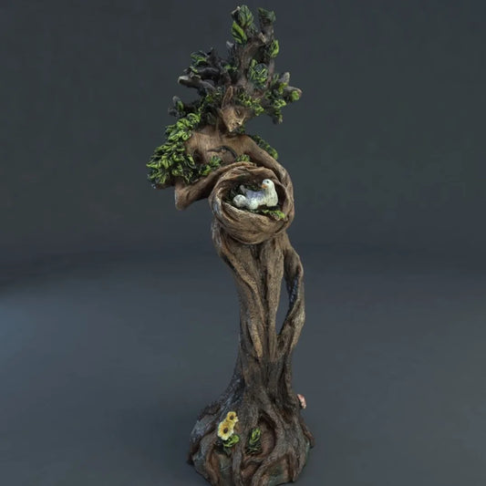 Forest Goddess Bird Statue featuring a goddess intertwined with tree branches and a bird's nest, perfect for home or garden décor.