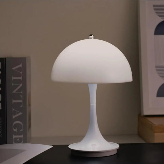 Rechargeable Bauhaus mushroom lamp with tap control, warm and cool light options, and a sleek retro design.