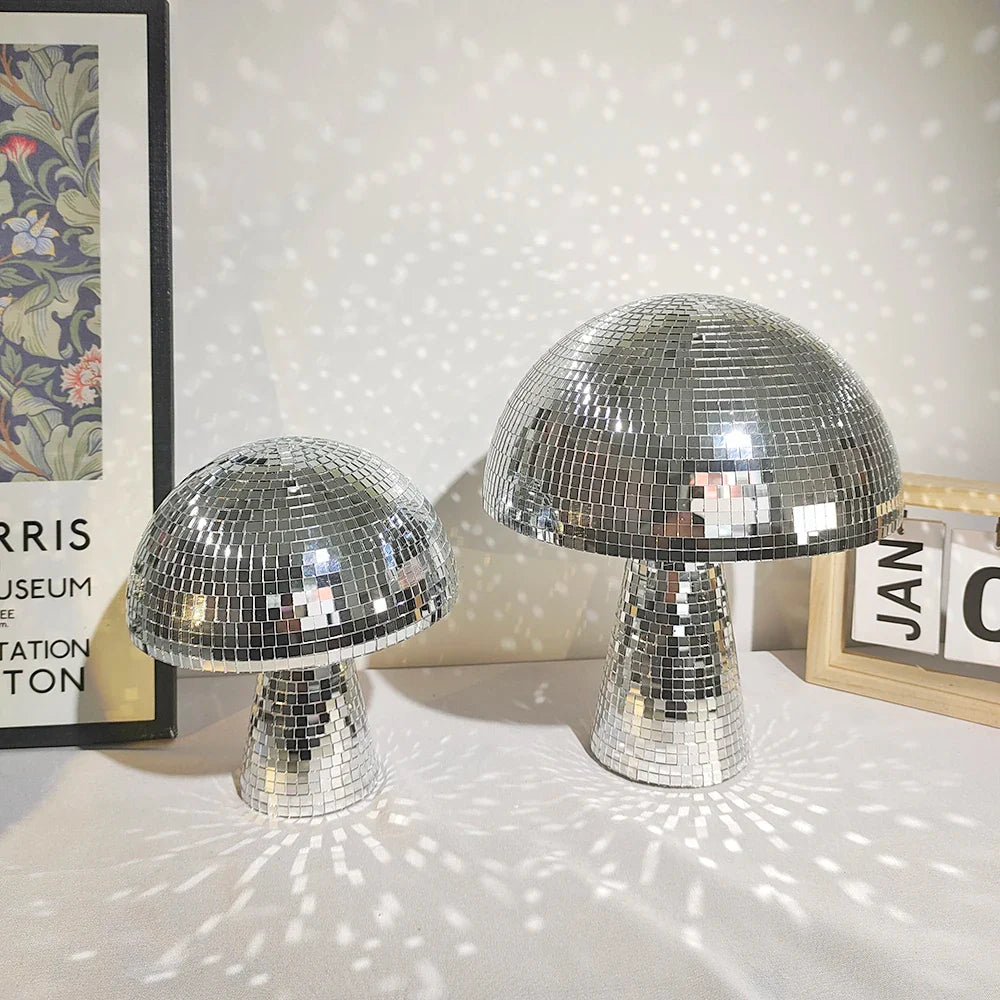 Handcrafted mirrored mushroom sculpture with reflective glass tiles, retro disco-inspired design, and a lightweight foam base. Perfect for home decor, event styling, and unique statement pieces.