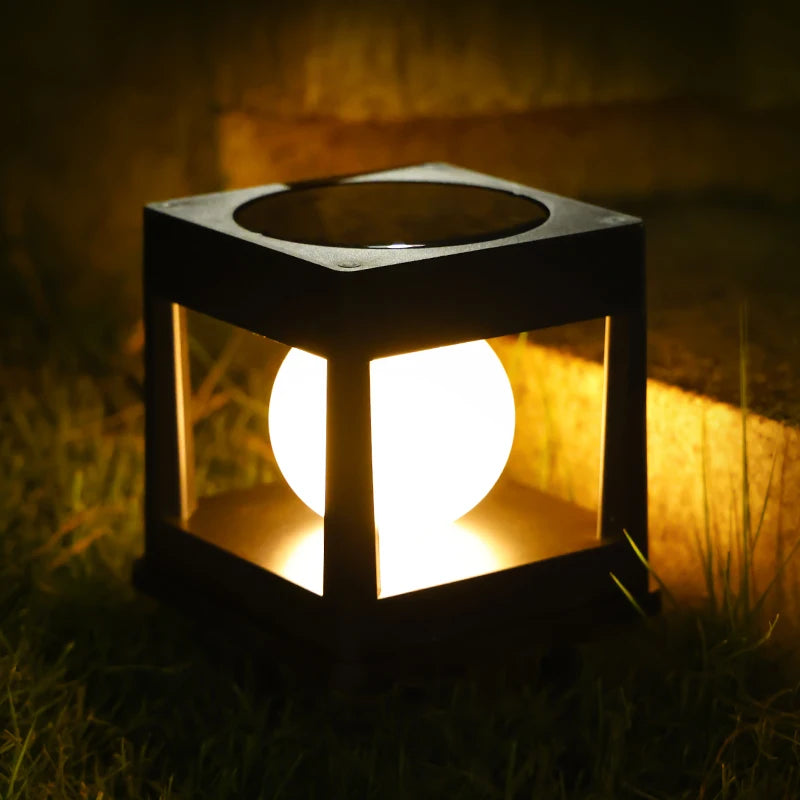 Solar post cap light illuminating a wooden fence, designed with a modern style and waterproof construction for outdoor spaces.