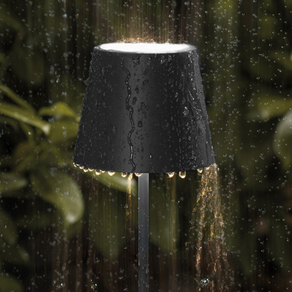 Modern dimmable tall table lamp with a sleek matte finish, touch-activated and USB-C rechargeable, providing adjustable warm lighting