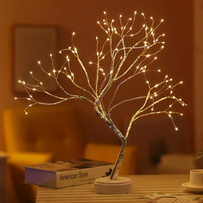 Fairy Tree Lamp with LED lights on flexible branches, perfect for cozy home decor.