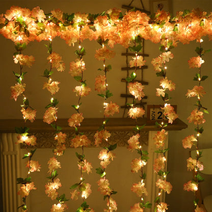 Cherry Blossom LED Garland with lifelike flowers and warm white LED lights, perfect for weddings, parties, and home décor.