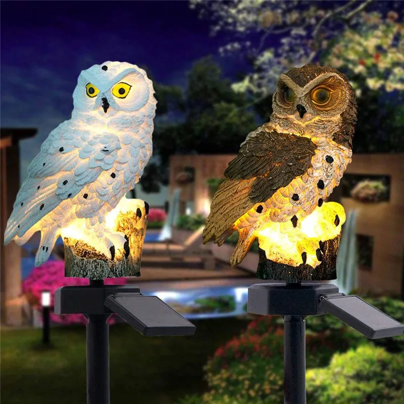 Owl solar garden lights with LED glow, solar-powered outdoor decor, waterproof owl stake light for lawns, patios, and pathways.