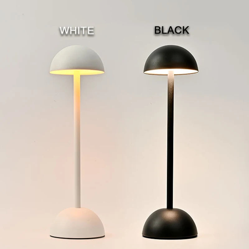 Black and white cordless mushroom-shaped LED desk lamp with touch control, ideal for bedside, dining, or study use.