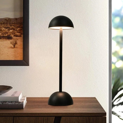 Black and white cordless mushroom-shaped LED desk lamp with touch control, ideal for bedside, dining, or study use.