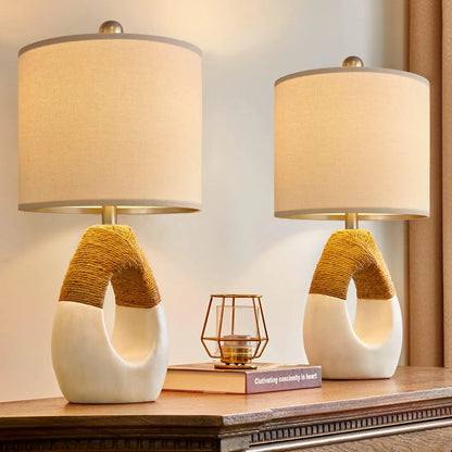 Set of 2 rattan lamps with resin base and cotton-wrapped design, ideal for rustic and modern bedroom or living room decor.