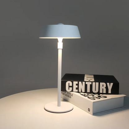 Portable LED table lamp with a touch sensor, designed for modern bedroom and study lighting.