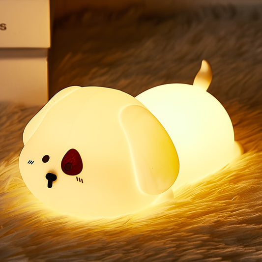 Cute puppy-shaped night light with soft silicone design, tap control, and rechargeable battery, ideal for home decor or as a gift.