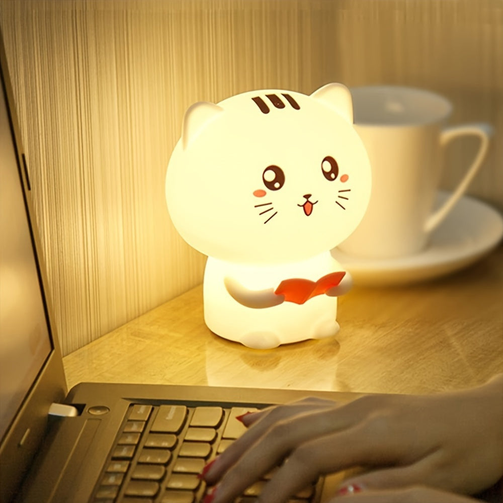 Cute reading kitty night light with 7 color-changing modes, soft silicone design, USB rechargeable, perfect for anime lovers and kids' room decor.