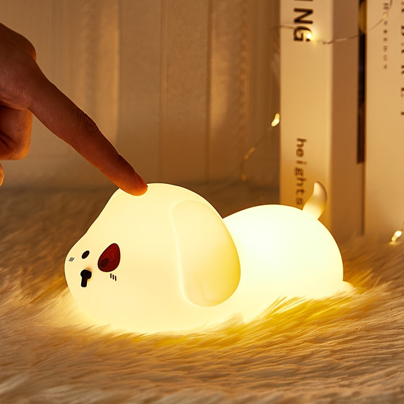 Cute puppy-shaped night light with soft silicone design, tap control, and rechargeable battery, ideal for home decor or as a gift.