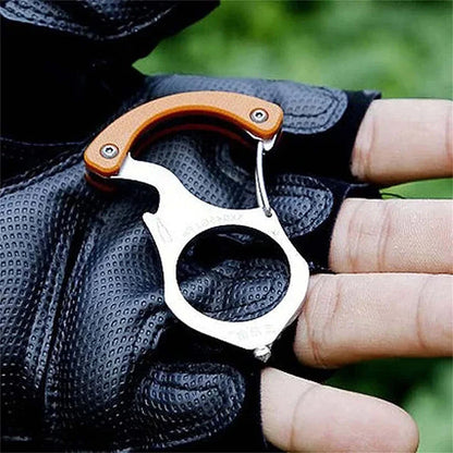 Compact multi-tool keychain with self-defense features, emergency window breaker, and LED flashlight.
