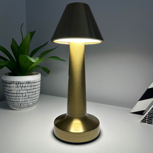 Modern cordless table lamp with adjustable lighting modes, ideal for home and hospitality use.