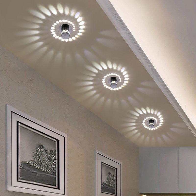 Modern spiral LED light for walls and ceilings with seven color options, energy-saving design in brushed nickel finish